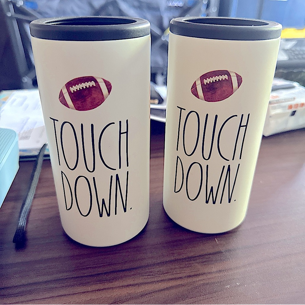 This Rae Dunn TOUCH DOWN slim can cooler to hold 12oz slim cans. 2 pack